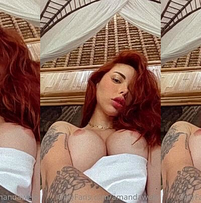 redhead girl Amanda Welp teasing her bare tits