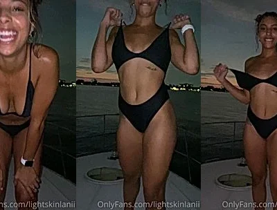 Puertoricanlexy flashing her naked tits on a boat