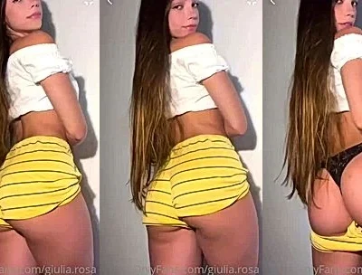 Giulia Rosa pulling her pants down and teasing her big butt