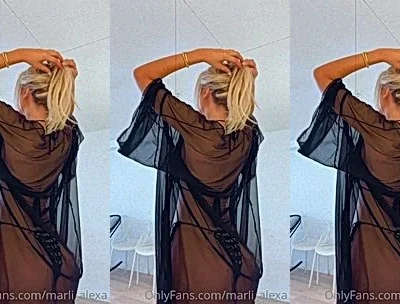 Mila Solana teasing her naked body in her see-through robe