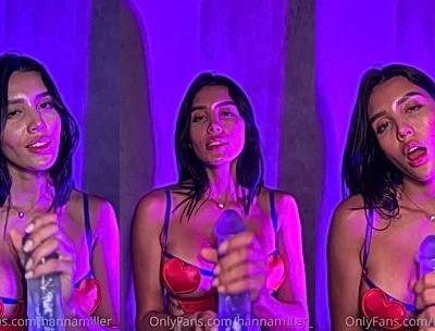 Hanna Miller sucking on a clear dildo