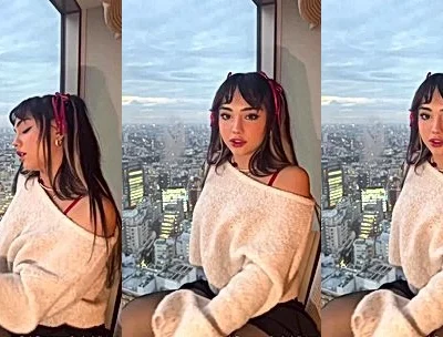 layladeline teasing by the hotel window