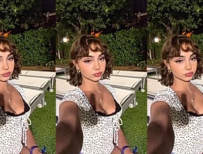 layladeline showing off her deep cleavage outdoors