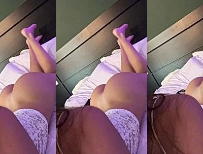 Giulia Rosa teasing her perky tits and feet in bed