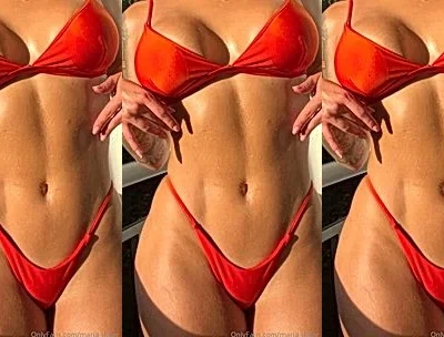 Maria Del Mar teasing her sexy body in her orange bikini