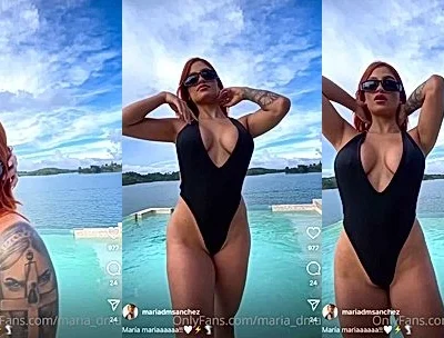 Maria Del Mar teasing her sexy body out in the ocean