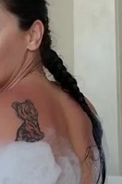 Sheena Ryder teasing her soapy naked body in the bathtub