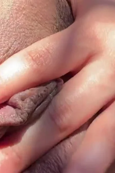 Thestartofus teasing her wet pussy in the sunshine