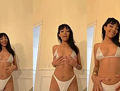 Neiima teasing her hot body in her white bikini