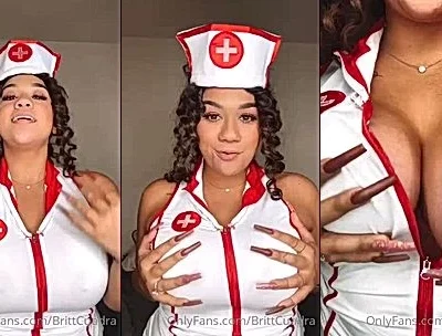 hot Latina nurse Britt Cuadra teasing her big tits