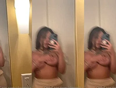Chromazz teasing her nipslip in the mirror