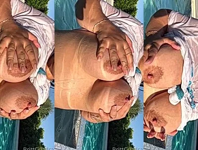 Britt Cuadra teasing her naked tits outdoors