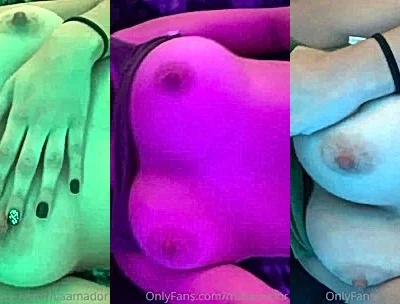 Neiima flashing her naked perky tits from her top