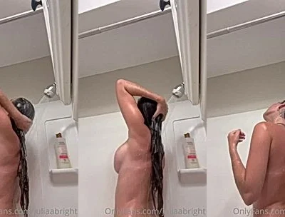 Juliaabright washing up her naked body in the shower
