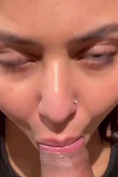 Taliyaandgustavo on her knees sucking on a thicc cock