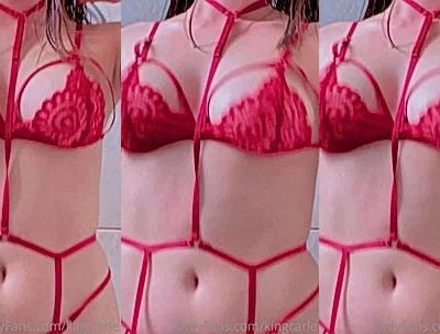 KingCarle teasing her big tits in red string lingerie