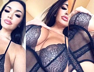 Genesis Mia Lopez teasing her big tits in mesh bodysuit