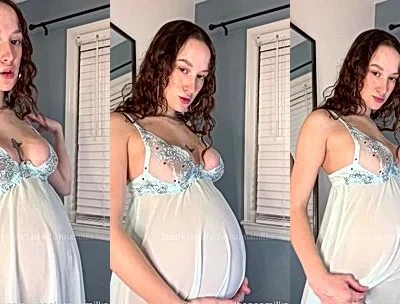 Rachel Hanna teasing her sexy pregnant belly in blue night gown