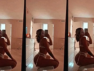 Agusanon teasing her sexy lingerie in the mirror