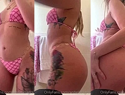 Anllela Sagra teasing her naked perky tits in pink panties