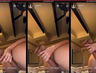 LupuWellness sucking a big dildo during livestream