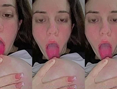 KingCarle licking her own nipples