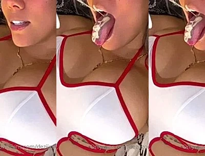 Dezii Gonzalez teasing her big tits in white top