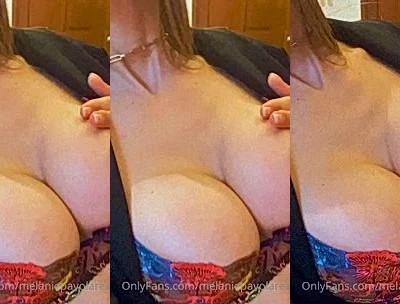 Melanie Pavola teasing her big tits in sexy bra
