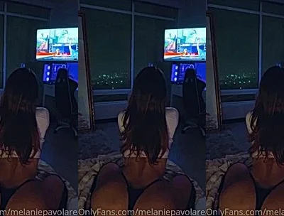 Melanie Pavola teasing her big booty while watching movie