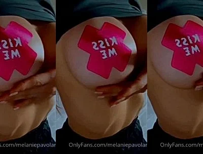 Melanie Pavola teasing her big tits with pink nipple pasties