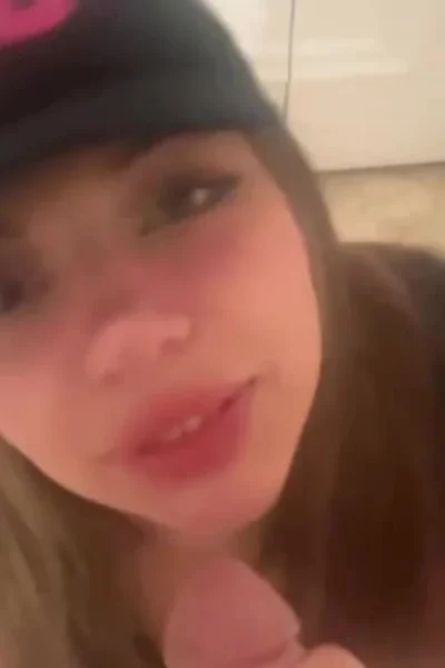 Katiana Kay on her knees sucking her boyfriend in the changing room