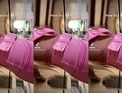 Katiana Kay showing off her big boobies in pink outfit