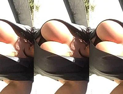 Emily Cheree teasing her big tits outdoors