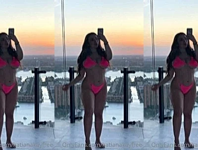 Katiana Kay teasing her big tits wearing pink bikini on the balcony