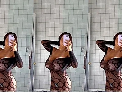 Danielley Ayalaa teasing her big tits in see-through top in the mirror