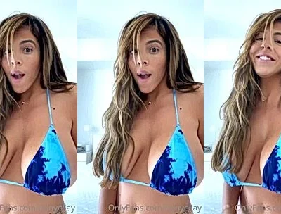 hot slut Danielley Ayalaa teasing her big tits in blue bikini
