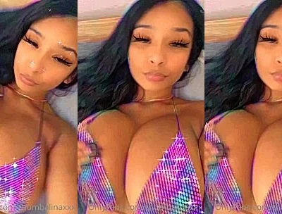 THUMBALINA playing with her big tits in purple bikini
