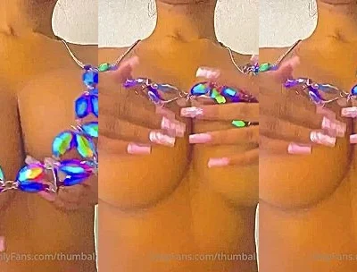 THUMBALINA playing with her naked big boobies