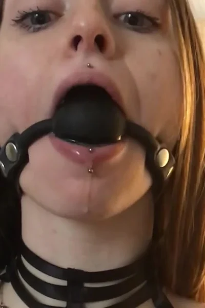 THUMBALINA showing off her mouthgag with dripping saliva