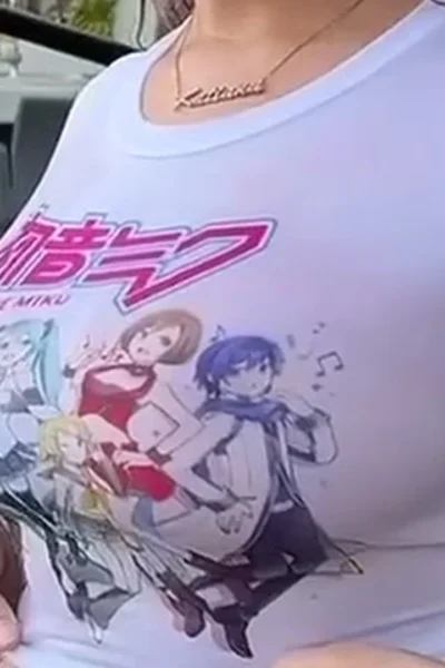 Katiana Kay teasing her big tits in her wet t-shirt