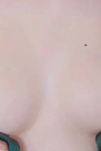 Defiantpanda playing with her naked tits in green lingerie